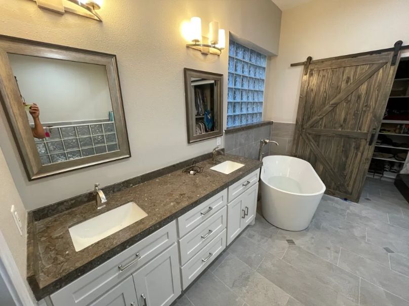 Bathroom vanity and freestanding tub